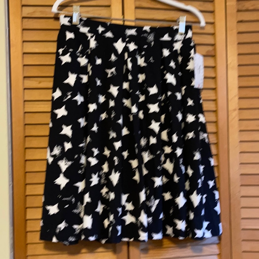 Pleated skirt with pockets